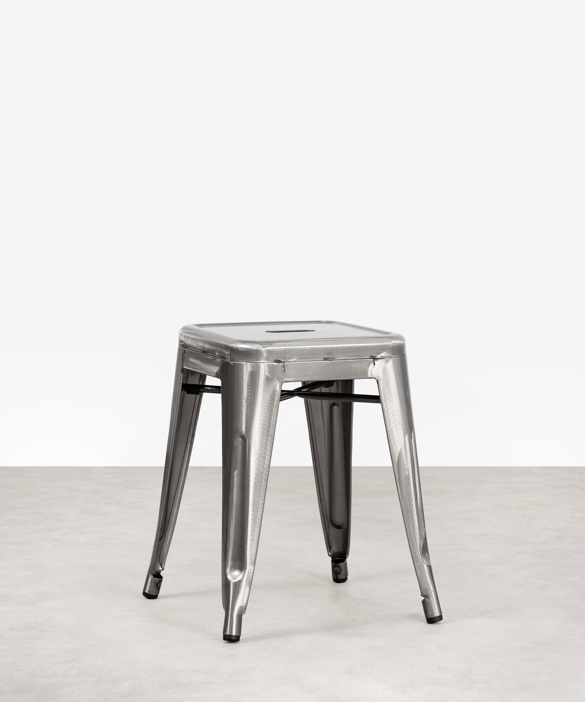 Taburete Bajo de Metal Tolik - Polished Edition Taburetes Northdeco Cromado